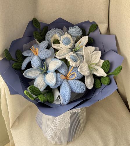 Crochet bouquet of blue and white gradients flower...