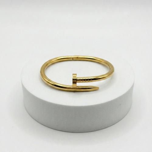 Golden nail bracelet