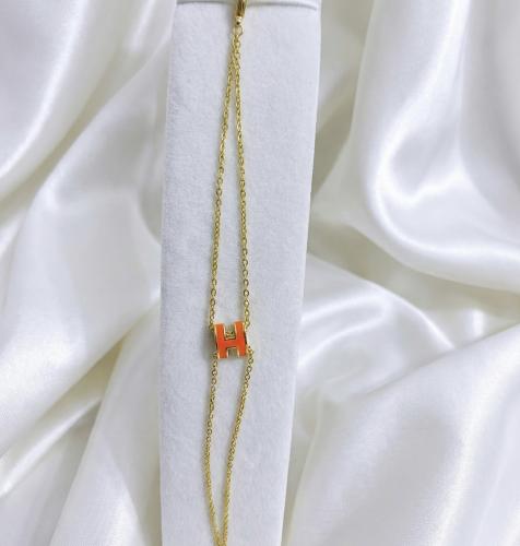 HERMS bracelet orange gold