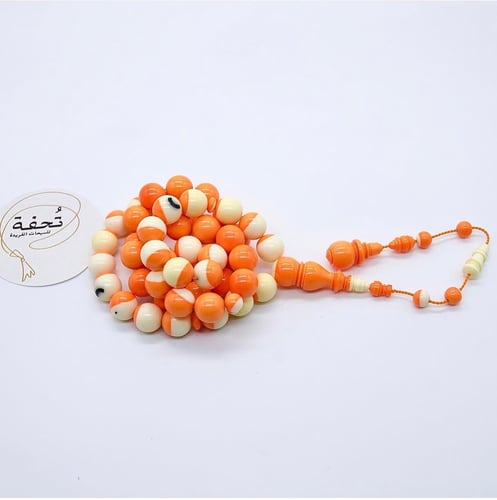 A twisted rosary from an old billiard ball