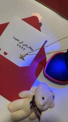 New butterfly pendant with illuminated phrase