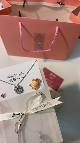 Four Hearts Necklace, write the phrase in the note