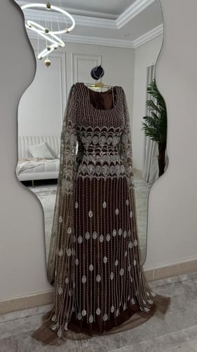 فستان اخضر مطرز