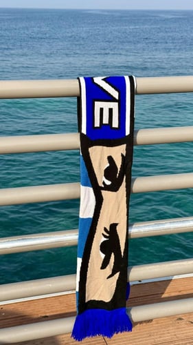 شال " جينا بنساند الابطال " " BLUE WAVE “