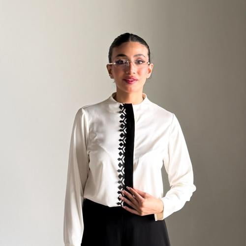 White blouse with black costar laser cut