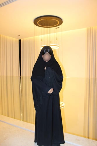 Black A-cut abaya with wide sleeves and silver cry...