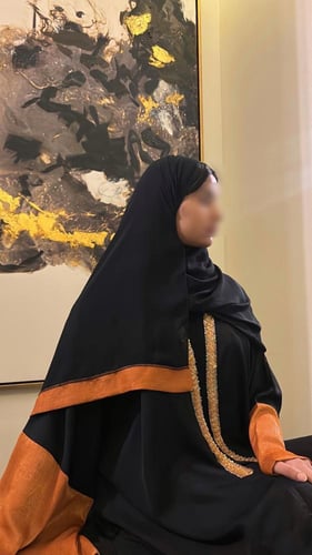Black A-line abaya with collar and wide orange sle...