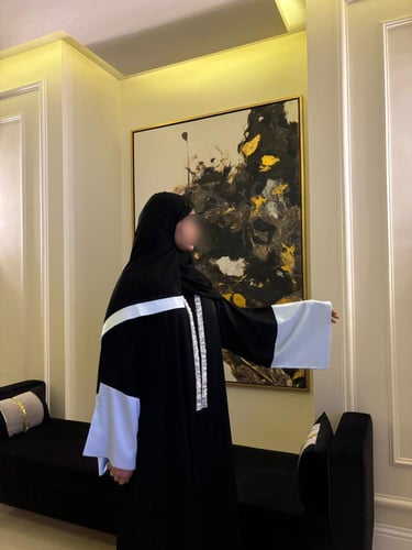 Black A-line abaya with collat and wide baby blue...