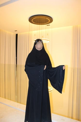 Black A-cut abaya with wide sleeves and silver cry...