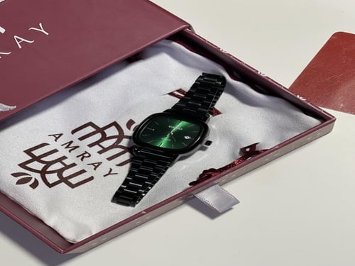 ساعه نسائيه اسود بأخضر