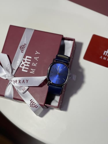 ساعات رجاليه جلد كحلي