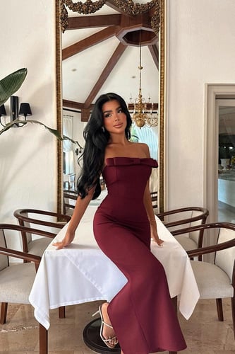 فستان طويل ضيق مزين بفيونكة من إييو اتيليه