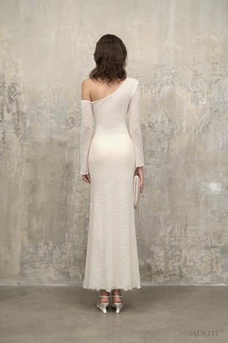 فستان زهره العاج من قماش محبوك