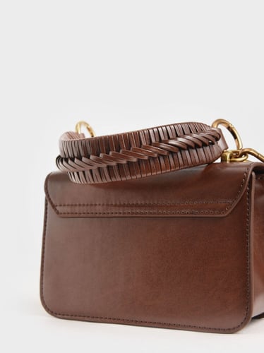 حقيبه ذات مقبض علوي بلون الشتوكولاته من تشارلز اند...