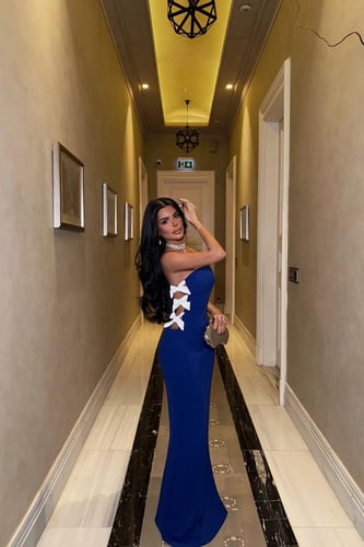 فستان مع فيونكات بالاطراف من آيو أتيليه