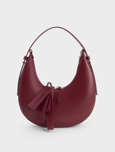 حقيبه باللون البرغندي من تشارلز اند كيث