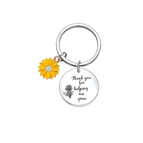 ميدالية بعبارة عن المعلمة