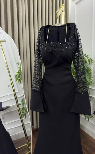 فستان بأكمام شك لون اسود