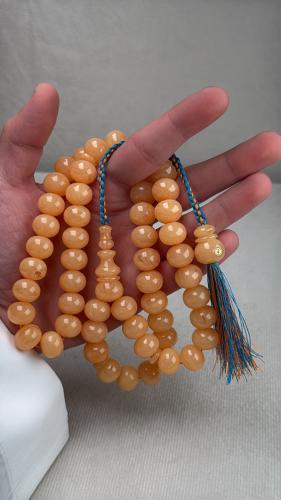 Fatoran Ammar prayer bead, flesh-colored.