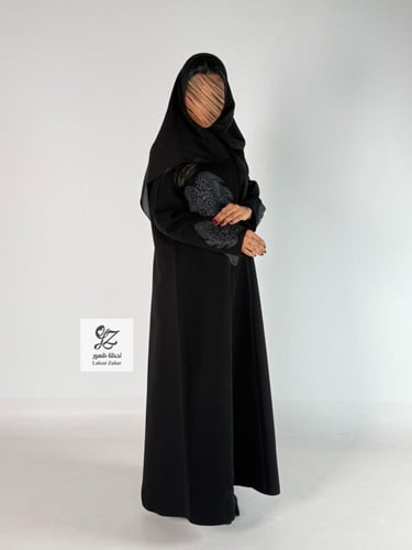 عبايه نيلان بقماش كريب اندنوسي بتدخيل تطريز مع شك