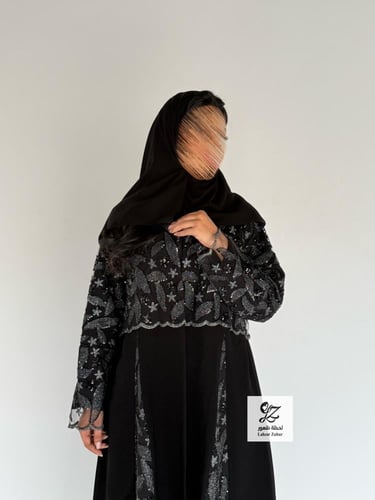 عبايه الغيد كلوش بقماش ملكي اسود بتدخيل تل ترتر