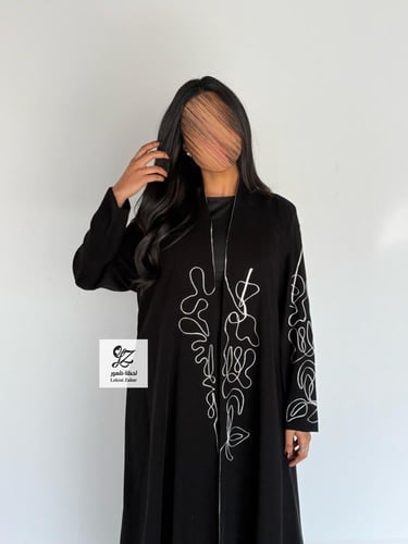 عبايه الماس بقماش سيراميك اسود تطريز ابيض
