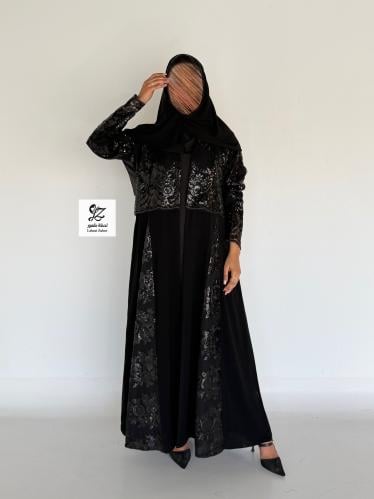 عبايه الغيد كلوش بقماش ملكي اسود بتدخيل تل ترتر