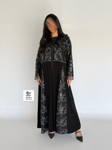 عبايه الغيد كلوش بقماش ملكي اسود بتدخيل تل ترتر