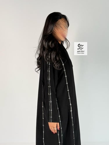 عبايه نوران كلوش بقماش كريب الابداع اسود فاحم