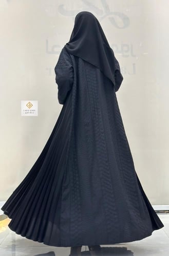 عبايه ركاما بكسرات ف الاجناب لون اسود