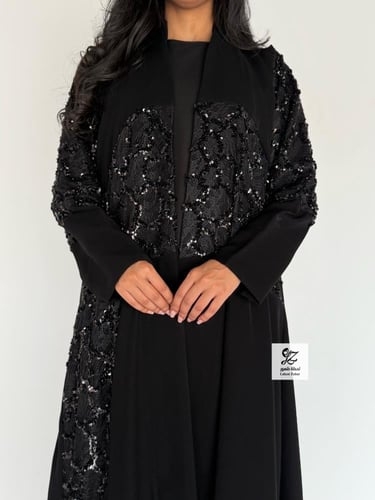 عبايه ضحئ بقماش سيراميك بتدخيل ترتر اسود