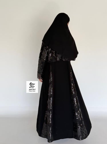 عبايه الغيد كلوش بقماش ملكي اسود بتدخيل تل ترتر