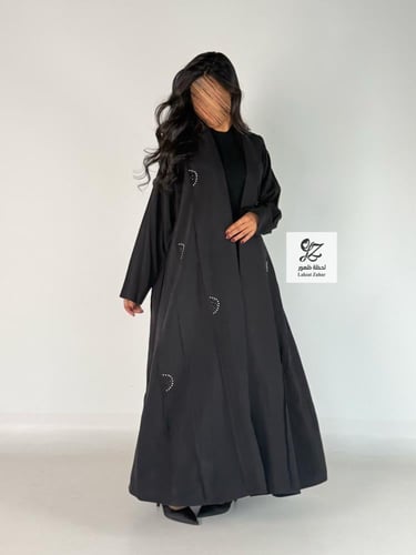 عبايه كلوش بقماش حرير ياباني بتدخيل شك ناعم