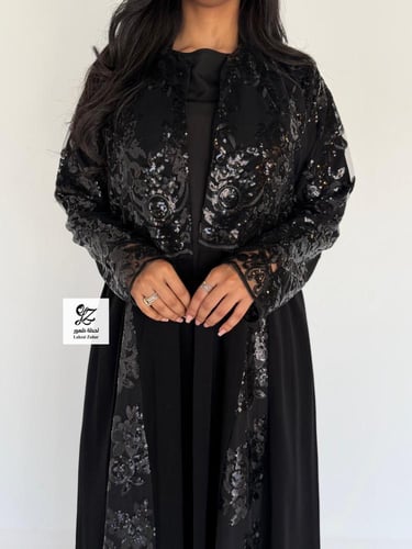 عبايه الغيد كلوش بقماش ملكي اسود بتدخيل تل ترتر