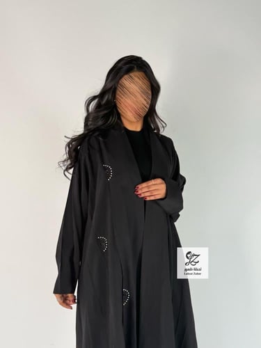 عبايه كلوش بقماش حرير ياباني بتدخيل شك ناعم