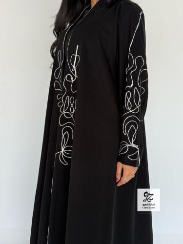 عبايه الماس بقماش سيراميك اسود تطريز ابيض