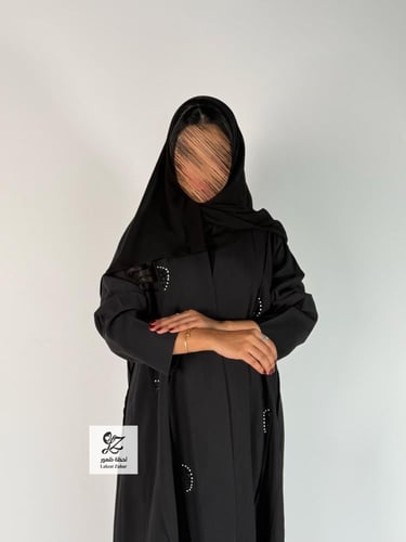 عبايه كلوش بقماش حرير ياباني بتدخيل شك ناعم