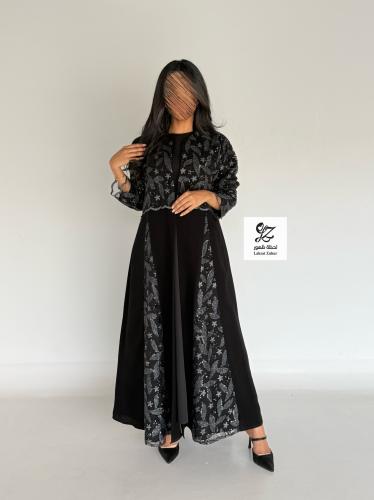 عبايه الغيد كلوش بقماش ملكي اسود بتدخيل تل ترتر
