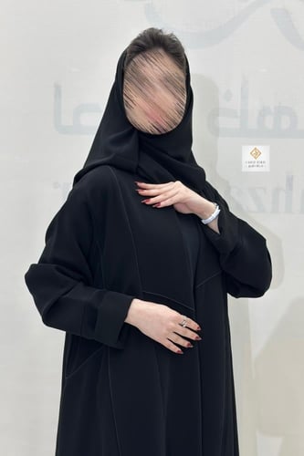 عبايه كلوش نسنسه بقماش سيراميك بتحديد اسود