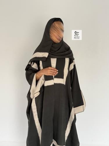عبايه غلا بقماش حرير ياباني بقصه نص بشت لون زيتي