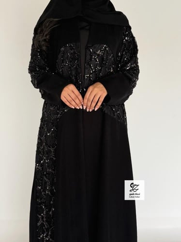 عبايه ضحئ بقماش سيراميك بتدخيل ترتر اسود