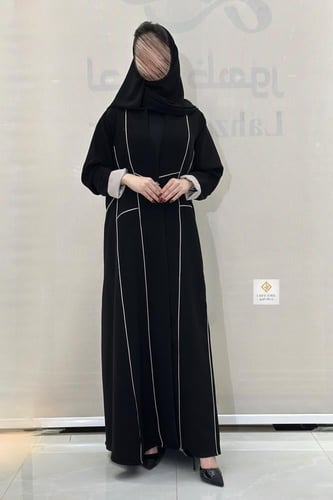 عبايه كلوش نسنسه بقماش سيراميك بتحديد بيج