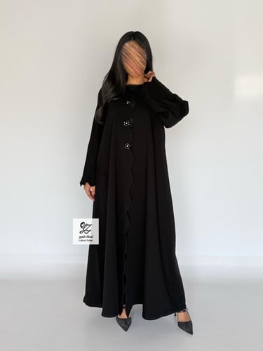 عبايه ريانه بقماش اندنوسي اسود بتدخيل زرار ناعم