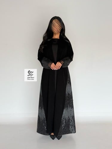 عبايه ريفان بقماش ملكي بتدخيله دانتيل اورجنز لمعه