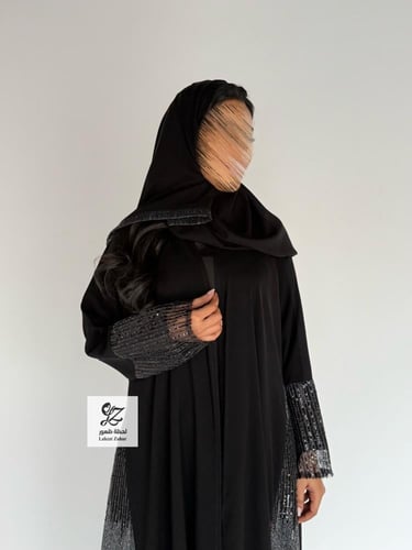 عبايه ريفان بقماش ملكي بتدخيله دانتيل اورجنز لمعه