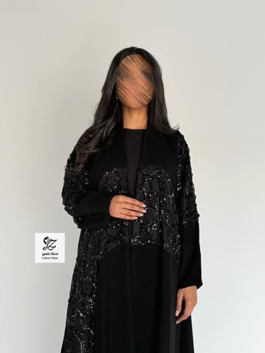 عبايه ضحئ بقماش سيراميك بتدخيل ترتر اسود