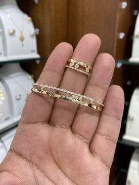 سوارة و خاتم ذهب عيار 18 وزن 18.12
