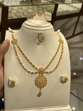 طقم ذهب عيار 21 وزن 23.52