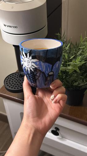 A piece of art for your coffee: a hand-painted cup...