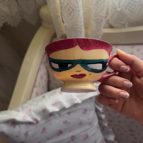 A piece of art: hand-painted face mug